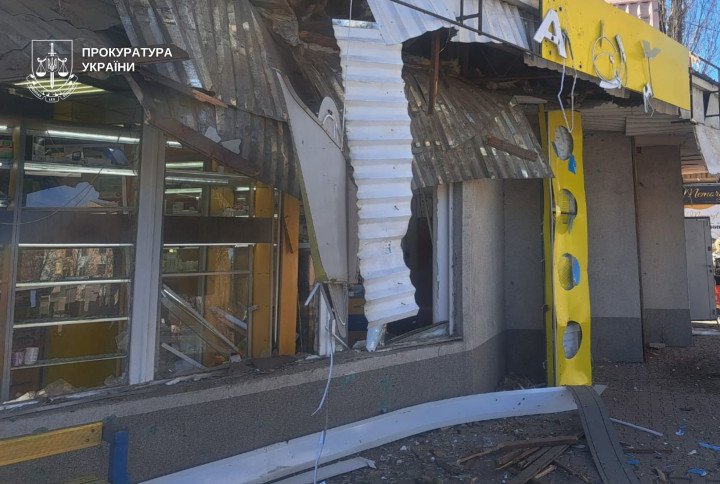A damaged pharmacy building in Nikopol after shelling, with shattered windows and structural destruction visible. (Source: Ukrainian Prosecutor’s Office)