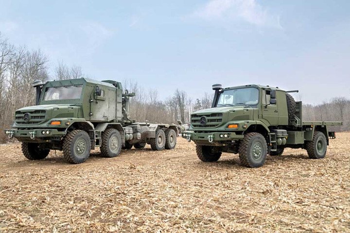 Mercedes-Benz Zetros military trucks are shown in a field. (Source: Mercedes-Benz Special Trucks)