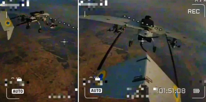Side-by-side drone footage shows a Ukrainian UAV equipped with multiple FPV drones mounted under each wing, confirming its role as an airborne drone carrier. (Source: Russian drone footage) Side-by-side drone footage shows a Ukrainian UAV equipped with multiple FPV drones mounted under each wing, confirming its role as an airborne drone carrier. (Source: Russian drone footage)