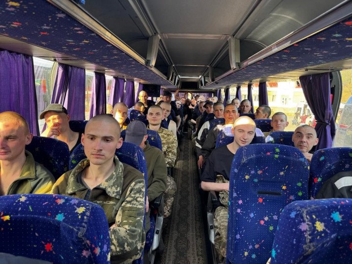 Recently freed Ukrainian servicemen sit inside a bus after their return from Russian captivity. (Source: Zelenskyy/Telegram) Recently freed Ukrainian servicemen sit inside a bus after their return from Russian captivity. (Source: Zelenskyy/Telegram)