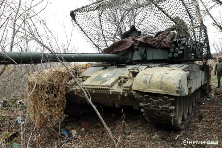 Ukrainian PT-91 Twardy Tank With Factory-Made Anti-Drone “Hood.” (Source: Ruslan Tarasov / ArmyInform) Ukrainian PT-91 Twardy Tank With Factory-Made Anti-Drone “Hood.” (Source: Ruslan Tarasov / ArmyInform)