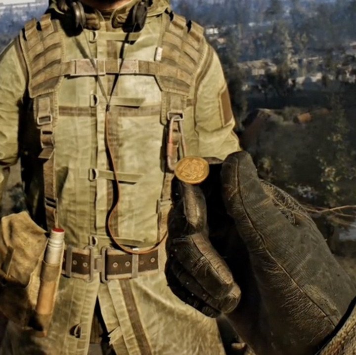 A close-up shot from STALKER 2: Heart of Chornobyl showcasing a Ukrainian coin, adding a subtle yet meaningful nod to the country’s currency and national identity within the game. A close-up shot from STALKER 2: Heart of Chornobyl showcasing a Ukrainian coin, adding a subtle yet meaningful nod to the country’s currency and national identity within the game.
