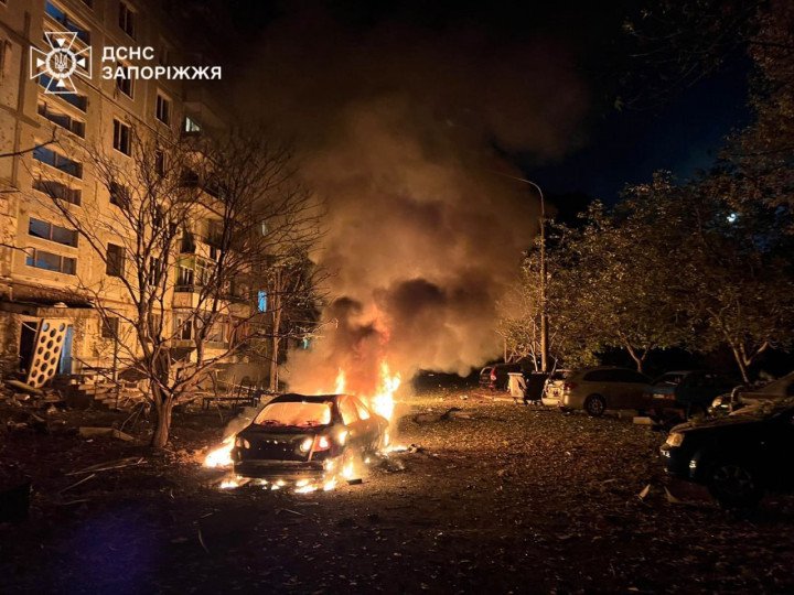 A car burns outside a damaged apartment building in Zaporizhzhia following Russia’s overnight drone and missile attack, October 5, 2025. (Source: State Emergency Service of Ukraine, Zaporizhzhia Region)