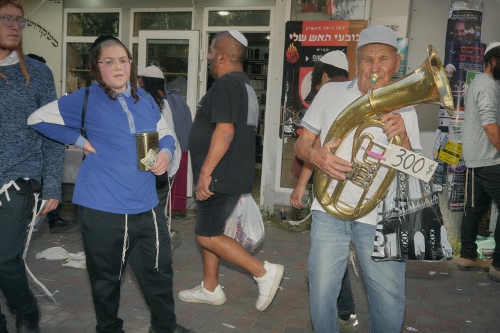 Busking in the street. Uman, Ukraine. September, 2025. Photo: Josh Olley/UNITED24 Media