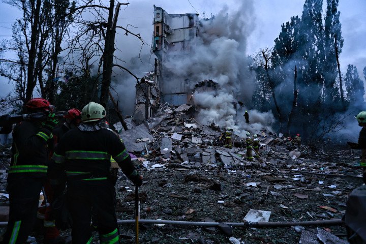 Rescuers work near partially destroyed residential building after Russian drone-and-missile attack on July 31, 2025 in Kyiv, Ukraine. (Photo by Yan Dobronosov/Global Images Ukraine via Getty Images)