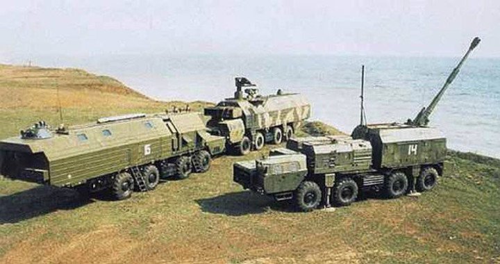 Original A-222 “Bereh” 130mm coastal artillery system battery positioned near shoreline with command and support vehicles. (Source: Open Source) Original A-222 “Bereh” 130mm coastal artillery system battery positioned near shoreline with command and support vehicles. (Source: Open Source)