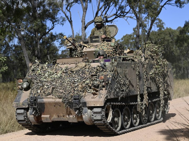 An Australian M113 Armored Personnel Carrier (APC) is seen driving along a road on June 11, 2026, in Townsville, Australia. (Source: Getty Images)