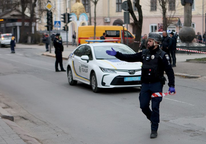 A police officer works at the scene of a reported Russian drone strike in Ivano-Frankivsk, Ukraine, on March 24, 2026. (Photo by Yurii Rylchuk via Getty Images)