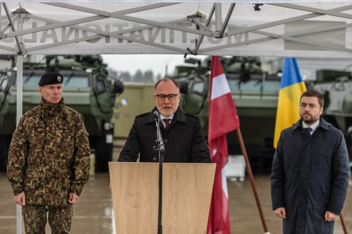 Latvian Defense Minister delivers remarks alongside Ukrainian representatives during the handover of Patria 6×6 armored vehicles in Riga. (Source: Ministry of Defense of Latvia) Latvian Defense Minister delivers remarks alongside Ukrainian representatives during the handover of Patria 6×6 armored vehicles in Riga. (Source: Ministry of Defense of Latvia)