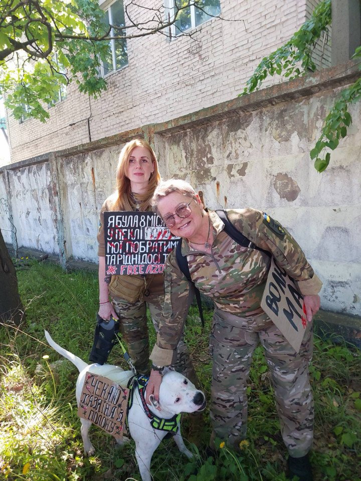 Tetiana “Khreshena” Tepliuk, “Valkiry” and Adi the dog, during an action in support of the Azovstal soldiers still held in Russian prisons (Source: Tetiana Tepliuk).
