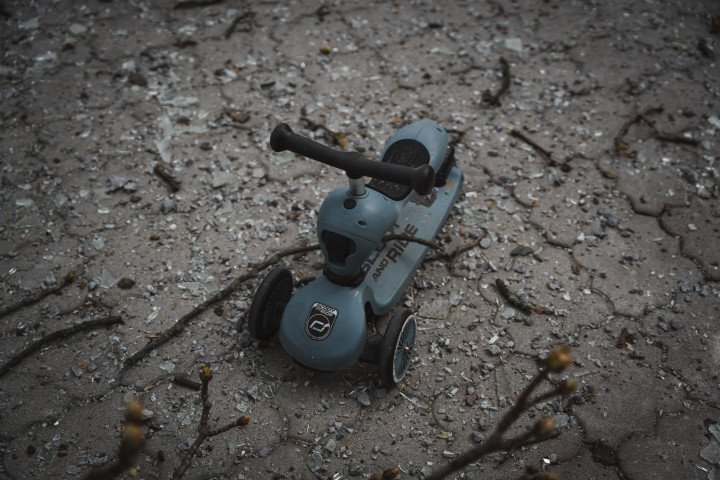 SUMY, UKRAINE - APRIL 13:  A children's scooter is left at the site of a Russian ballistic missile strike on the city centre, killing many civilians on April 13, 2025 in Sumy, Ukraine. The death toll after Russian ballistic missiles' attack on the center of Sumy has risen to 34, including two children. At least 117 people have been injured, including 15 children. On Palm Sunday, the Russian army launched two ballistic missiles with cluster munition at the central part of the city at a time when there were many people on the streets - dozens of people were killed and injured in the city; civilian infrastructure and residential buildings were damaged or destroyed. (Photo: Denys Kryvopyshyn via Getty Images)