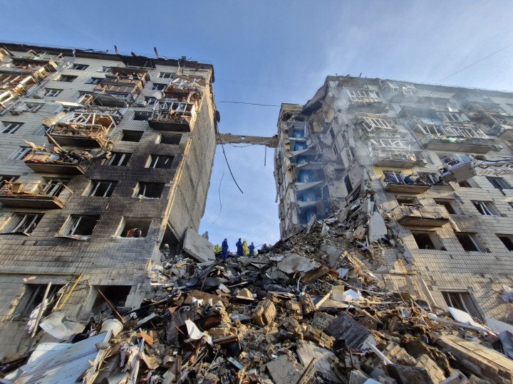 Rescuers search a partially collapsed residential building after a Russian drone and missile attack on Kyiv on June 17, 2025, which killed at least 14 people and injured 40. (Source: Getty Images) Rescuers search a partially collapsed residential building after a Russian drone and missile attack on Kyiv on June 17, 2025, which killed at least 14 people and injured 40. (Source: Getty Images)