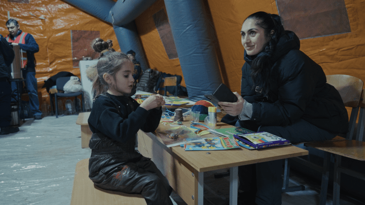 Mia and her mother at an Invincibility Point in Kyiv, Ukraine’s capital on January 15. (Photo: UNITED24 Media) 