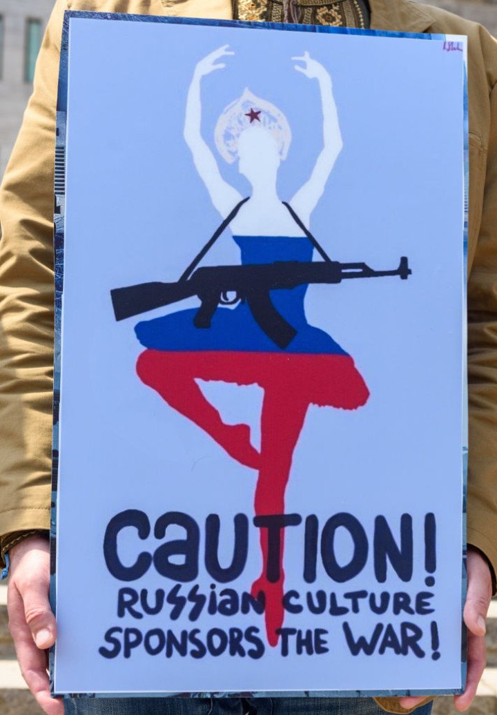 A Ukrainian holds a placard during a protest against the Bolshoi Ballet Gala Show. Photo: Kim Jae-Hwan/SOPA Images/LightRocket via Getty Images.