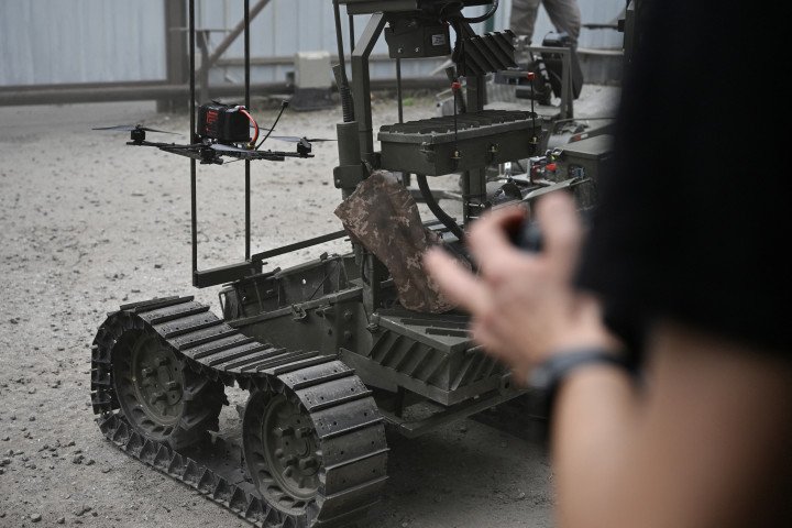 An employee controls an unmanned ground vehicle in an undisclosed location in Ukraine on June 3, 2026, amid the Russian invasion of Ukraine. (Photo by Genya Savilov via Getty Images)