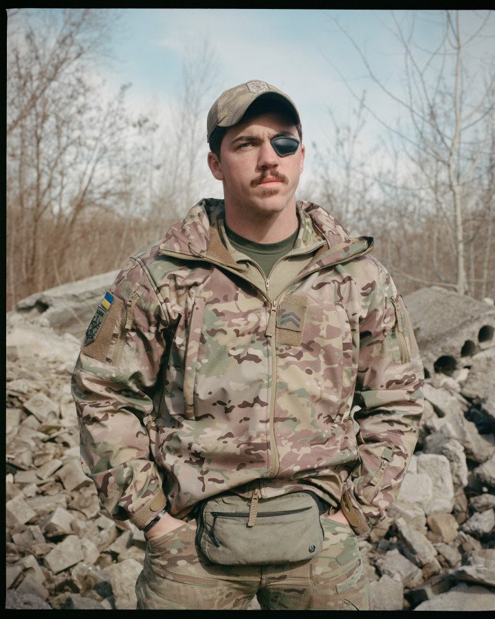Uno, 23, a former U.S. Marine and Afghan War veteran, has spent the last 18 months fighting in Ukraine. As infantry assault platoon commander with Azov, he continues to lead despite losing an eye to an explosion. Uno, 23, a former U.S. Marine and Afghan War veteran, has spent the last 18 months fighting in Ukraine. As infantry assault platoon commander with Azov, he continues to lead despite losing an eye to an explosion.