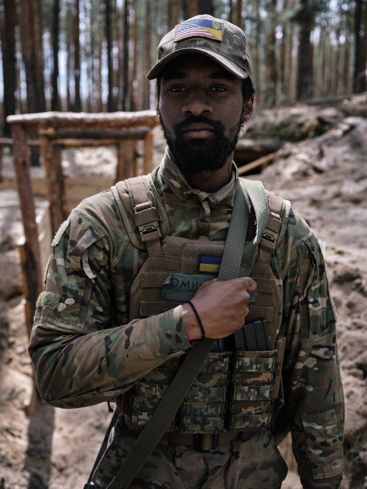 Omni Shine from New York, former medical assistant, serves as an infantryman with the 3rd Assault. He has served in the U.S. military but has no prior combat experience. Omni Shine from New York, former medical assistant, serves as an infantryman with the 3rd Assault. He has served in the U.S. military but has no prior combat experience.