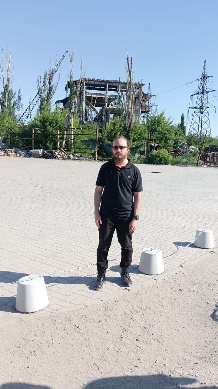 Lucas Leiroz, a pro-Russian propagandist standing in front of the Ukrainian Azovstal metallurgical plant in the temporarily Russian-occupied city of Mariupol. (Source: Lucas Leiros via X) Lucas Leiroz, a pro-Russian propagandist standing in front of the Ukrainian Azovstal metallurgical plant in the temporarily Russian-occupied city of Mariupol. (Source: Lucas Leiros via X)