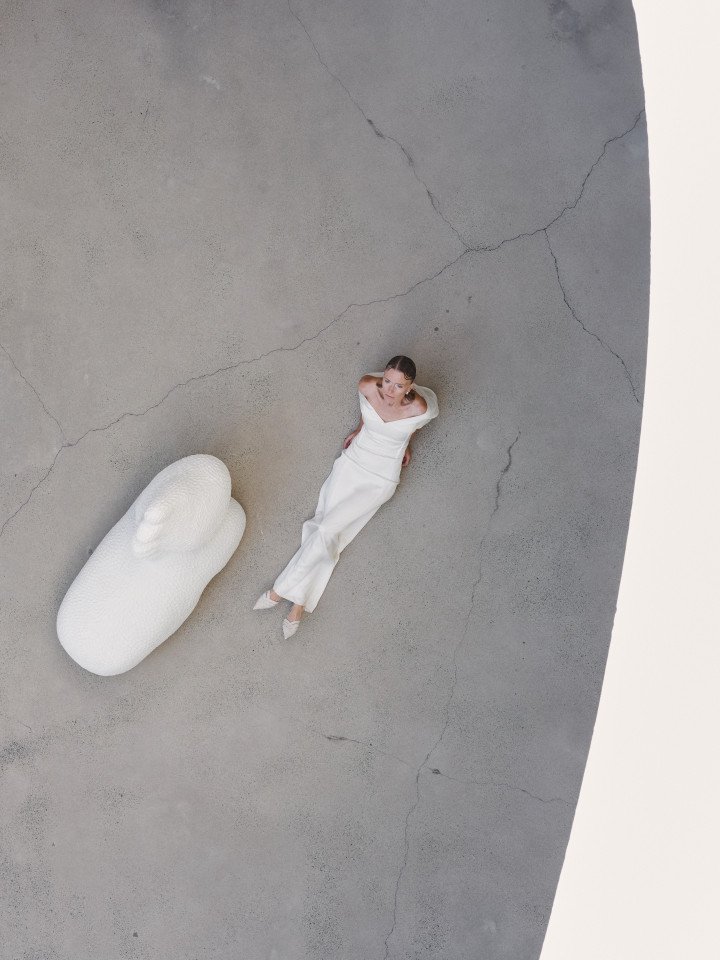 Model posing with on of the hand sculpted lights modeled into mythical creatures made from Yakusha’s Ztista material. (Photo: Victoria Yakusha, FAINA) Model posing with on of the hand sculpted lights modeled into mythical creatures made from Yakusha’s Ztista material. (Photo: Victoria Yakusha, FAINA)