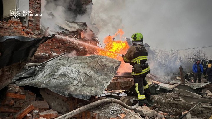A firefighter battles flames amid rubble and debris after a Russian attack damaged residential buildings in Kyiv region. (Source: State Emergency Service of Ukraine) A firefighter battles flames amid rubble and debris after a Russian attack damaged residential buildings in Kyiv region. (Source: State Emergency Service of Ukraine)