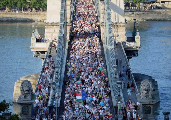 People demonstrating for press freedom in Hungary after a Hungarian online news editor's sudden termination sparked protests in Budapest for publishing a story which embarrassed Prime Minister Viktor Orban's government. (Source: Attila Kisbenedek) People demonstrating for press freedom in Hungary after a Hungarian online news editor's sudden termination sparked protests in Budapest for publishing a story which embarrassed Prime Minister Viktor Orban's government. (Source: Attila Kisbenedek)