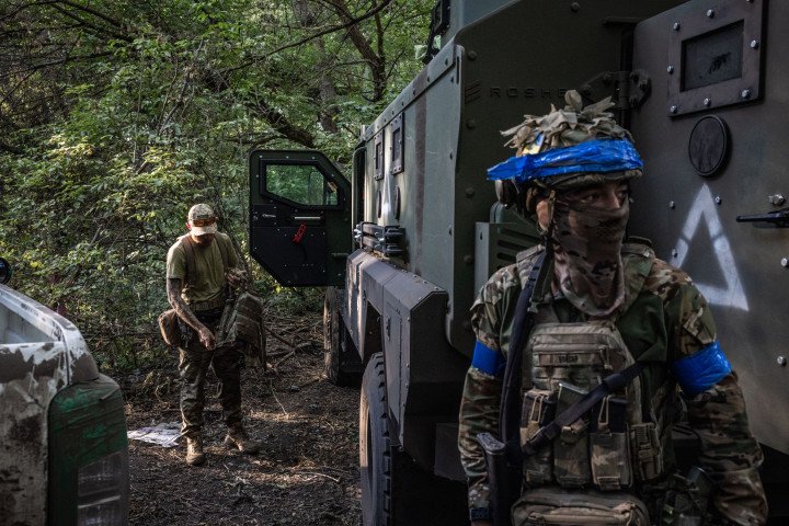 A Ukrainian drone unit commander, known as Boxer, stands before vehicles at a military position in Ukrainian-controlled territory in Russia’s Kursk Region on August 18, 2024. (Source: Getty Images) A Ukrainian drone unit commander, known as Boxer, stands before vehicles at a military position in Ukrainian-controlled territory in Russia’s Kursk Region on August 18, 2024. (Source: Getty Images)