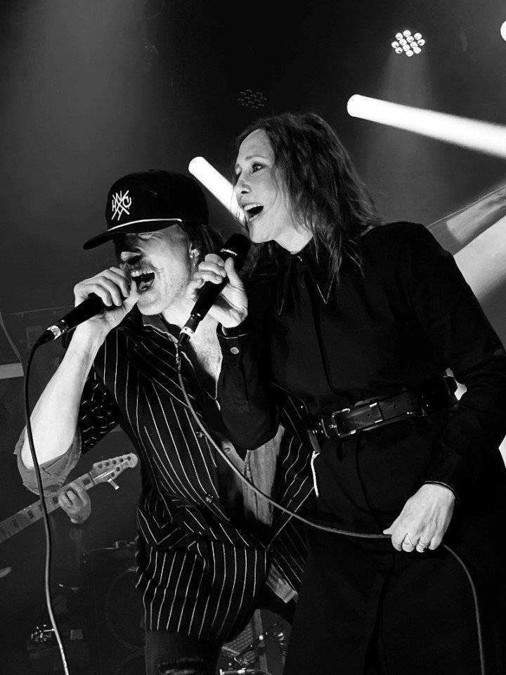 Vera Farmiga and Eugene Hütz perform “Chervona Ruta” live on stage, uniting punk energy and Ukrainian soul in celebration of Kupala Night. (Source: Dark Lens Photos) Vera Farmiga and Eugene Hütz perform “Chervona Ruta” live on stage, uniting punk energy and Ukrainian soul in celebration of Kupala Night. (Source: Dark Lens Photos)