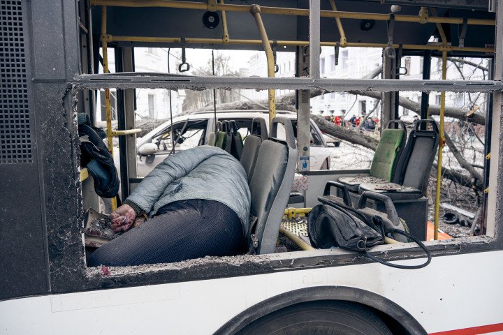 The body of a woman killed by a Russian ballistic missile strike on the city center lies in a wrecked trolleybus on April 13, 2025, in Sumy, Ukraine. (Source: Getty Images) The body of a woman killed by a Russian ballistic missile strike on the city center lies in a wrecked trolleybus on April 13, 2025, in Sumy, Ukraine. (Source: Getty Images)