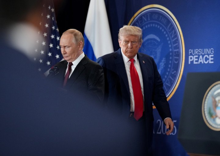 ANCHORAGE, ALASKA - AUGUST 15: U.S. President Donald Trump (R) and Russian leader Vladimir Putin arrive for a press conference at Joint Base Elmendorf-Richardson on August 15, 2025 in Anchorage, Alaska. (Photo by Andrew Harnik/Getty Images) ANCHORAGE, ALASKA - AUGUST 15: U.S. President Donald Trump (R) and Russian leader Vladimir Putin arrive for a press conference at Joint Base Elmendorf-Richardson on August 15, 2025 in Anchorage, Alaska. (Photo by Andrew Harnik/Getty Images)