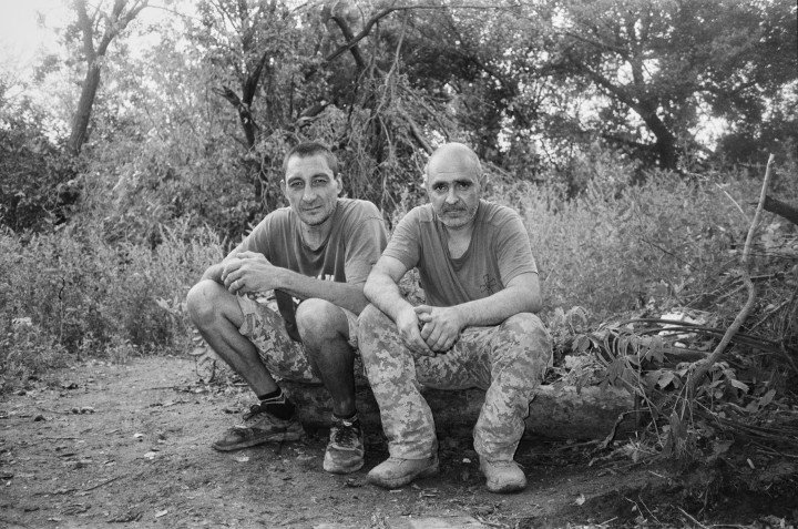 Driver and engineer of the M109 Howitzer take a break in-between work. Kostiantynivka, August 2025. Photo: Josh Olley/UNITED24 Media