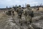 Ukrainian soldiers from the 120th Territorial Defense Battalion take part in training exercises near the Belarus border in the Chernobyl area, March 16, 2024. (Source: Getty Images)