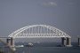 Cargo ships transit the Kerch Strait near the Crimean Bridge in July 2023. (Source: Getty Images)