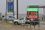 Gas prices, including diesel at $7.69 per gallon, are displayed at a gas station outside Taft, in Kern County, California, on October 21, 2026.