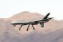 An MQ-9 Reaper remotely piloted aircraft (RPA) flies by during a training mission at Creech Air Force Base on November 17, 2015, in Indian Springs, Nevada. (Source: Getty Images)