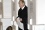 Russia's leader Vladimir Putin at a polling station in Moscow, 14 March 2004. (Source: Getty Images)