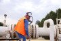 A worker operates a valve at the Jandar Gas Power Plant during the start of natural gas delivery from Azerbaijan to Syria via the Turkiye-Syria Natural Gas Pipeline on August 09, 2025. (Source: Getty Images)