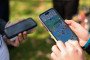 People play the Pokemon GO game on smartphones. (Source: Getty Images)