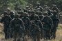 Polish Army soldiers from the 3rd Podkarpacka Territorial Defense Brigade are seen during training at the Nowa Dba military training area as part of exercise Iron Defender 25. (Source: Getty Images)