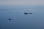Russian Tu-22M3 bomber escorted by a Swedish JAS 39 Gripen fighter over the Baltic Sea during an interception mission. (Source: Swedish Air Force)