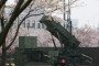 Japanese Air Self-Defense Forces' Patriot Advanced Capability-3 (PAC-3) interceptor missile launcher is put back in its place at the defense ministry in Tokyo on April 5, 2009.