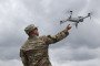 A soldier with the 101st Airborne 2-327 Multi-Purpose Company catches a drone in the Pentagon parking lot on June 14, 2025, in Arlington, Virginia. (Source: Getty Images)