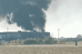 Smoke rises from a passenger train following a Russian drone strike in Ukraine. (Source: Kyiv INFO/Telegram)