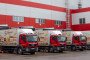 Trucks parked at loading bays outside a Magnit PJSC distribution center in Dmitrov, Russia, on May 21, 2021. Illustrative image. (Source: Getty Images)
