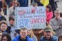 A protester holds a “Stop genocide in Ukraine” placard during the demonstration in Trafalgar Square in London, UK on March 20, 2023. (Source: Getty Images)
