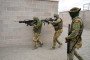 Armed Ukrainian military personnel take part in an urban warfare exercise, conducted by the Spanish military, at the Toledo infantry academy in Toledo, Spain, on March 24, 2023. (Source: Getty Images)
