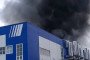 Thick black smoke rises from the Proton-PM rocket engine plant near Perm, Russia, following a fire at the facility. (Source: Exilenova+)
