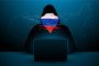 Illustrative image of a hacker wearing a hoodie, with the Russian flag overlayed on the face. (Photo: Getty Images)