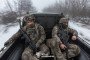Ukrainian soldiers ride in the back of a military truck. (Source: 93rd Mechanized Brigade)