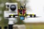 A so-called hunter drone is seen in front of a mobile sensor unit for drone detection, in eastern Germany, on October 8, 2025.