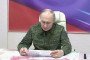 A screen grab from a video shows Russian leader Vladimir Putin, dressed in military uniform, visiting a command post in Kursk, Russia, on March 12, 2025. (Source: Getty Images)